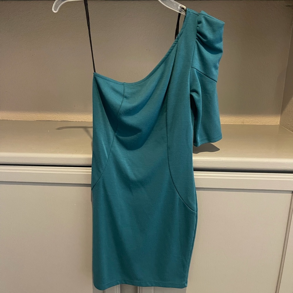 Flirty and fun, one should teal mini dress